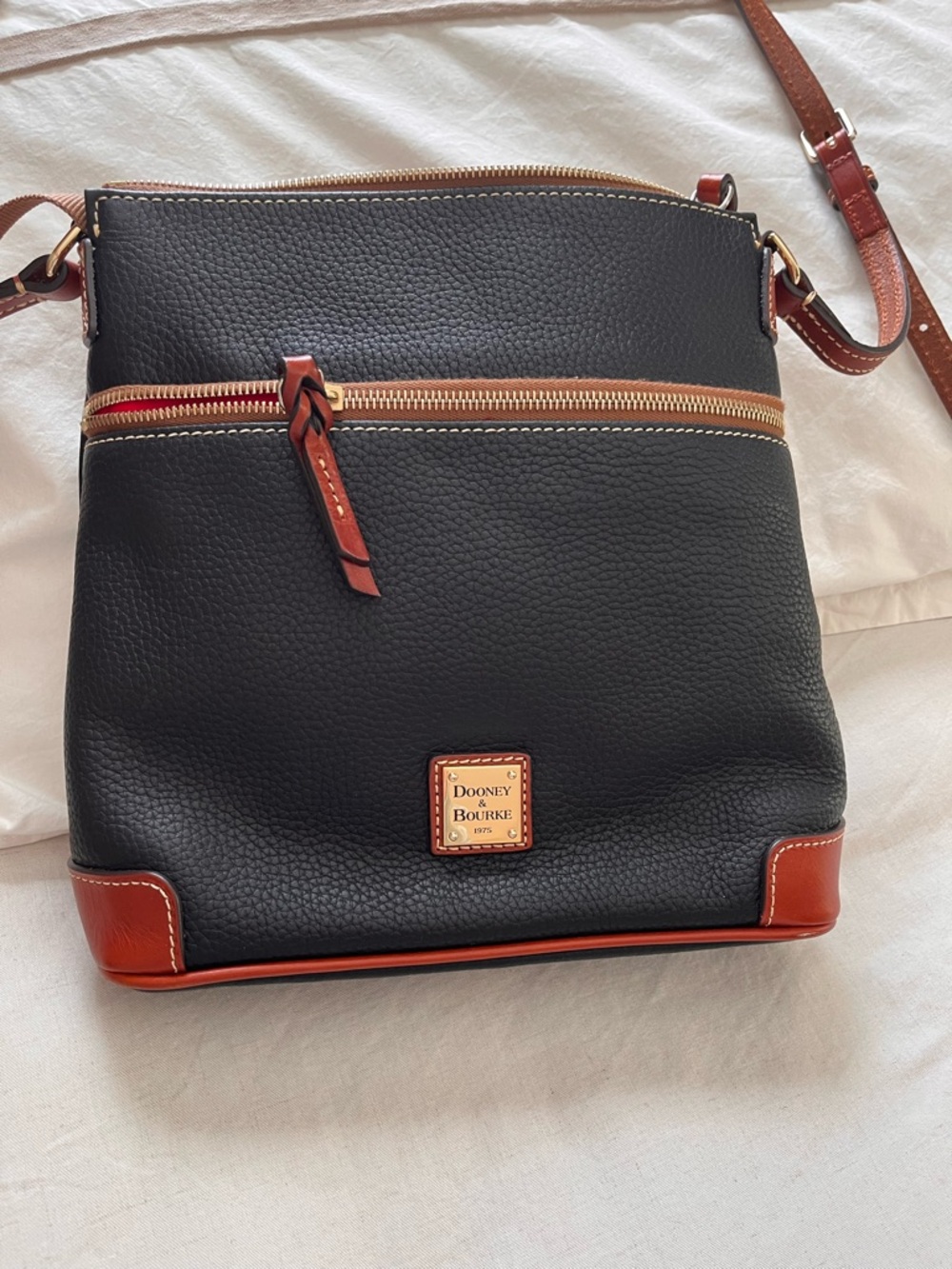 Dooney & Bourke Black Pebbled Leather Messenger with Brown Trim